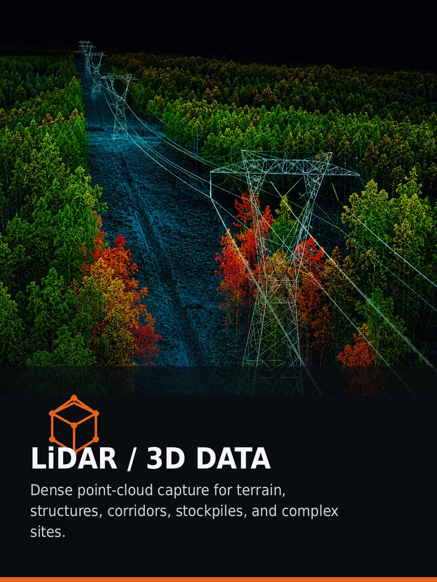 Colorized LiDAR point cloud of a transmission corridor with structures, conductors, and vegetation